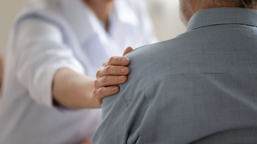 hand on shoulder