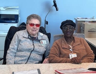 two women smiling