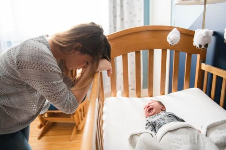 mother looking at her baby