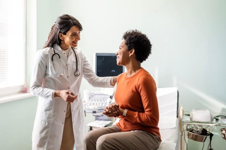 doctor talking to patient