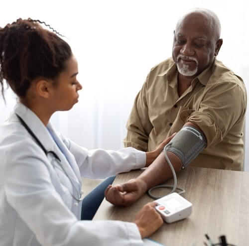doctor helping a patient
