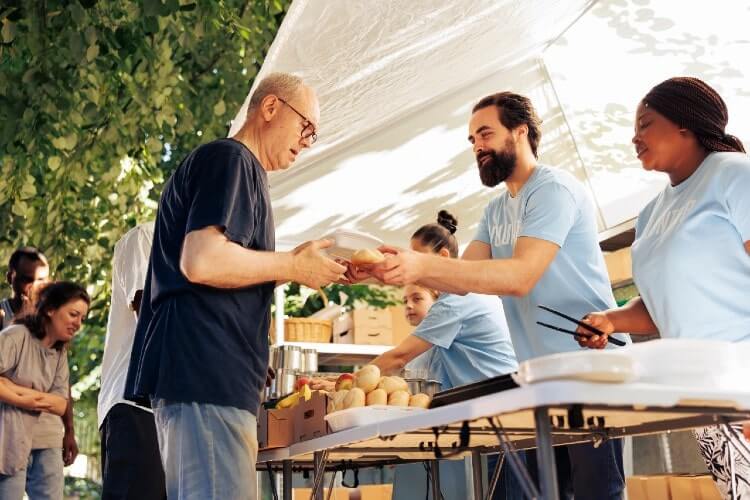 man being served food
