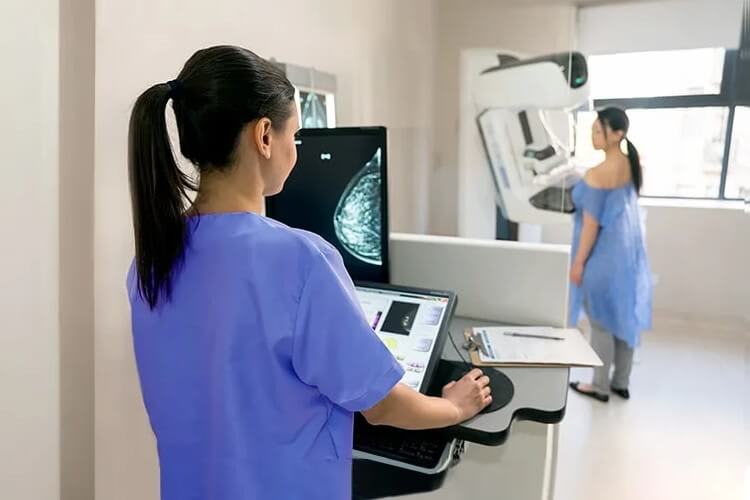 patient getting a mammogram