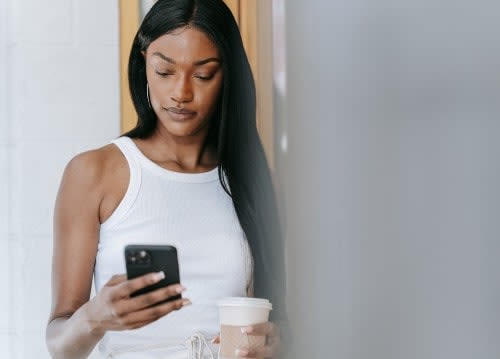 woman looking at her phone