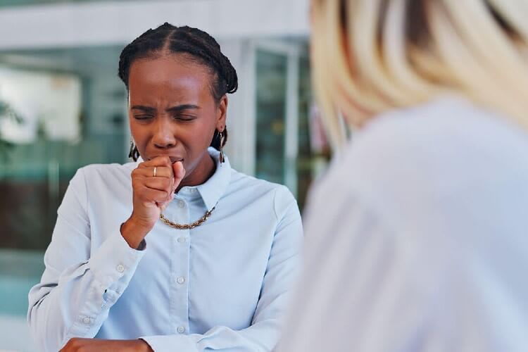 woman coughing