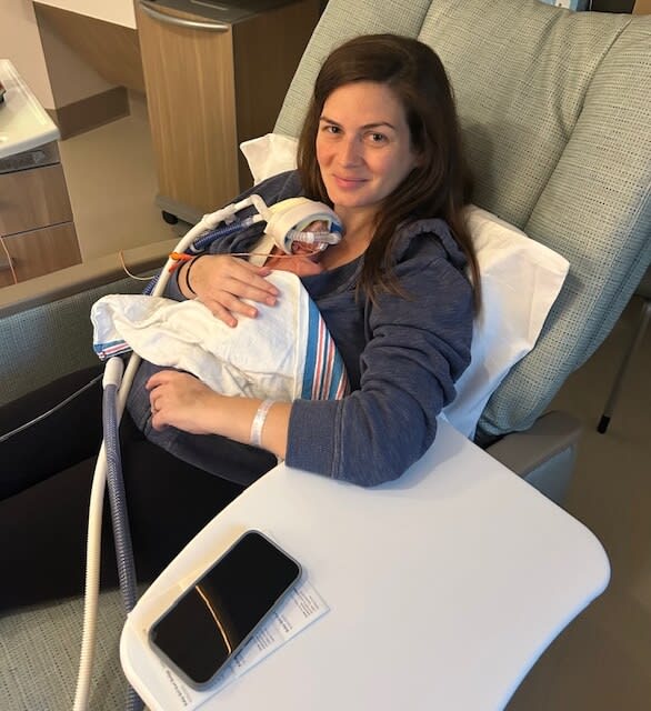 mother holding her baby