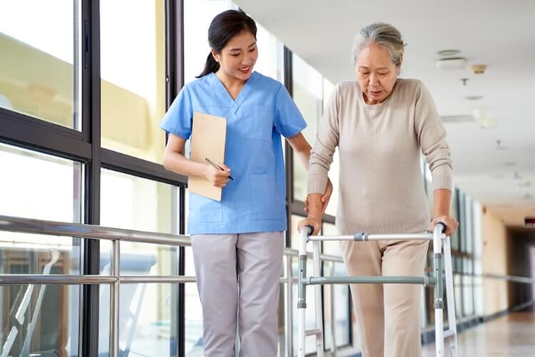 nurse assisting a patient