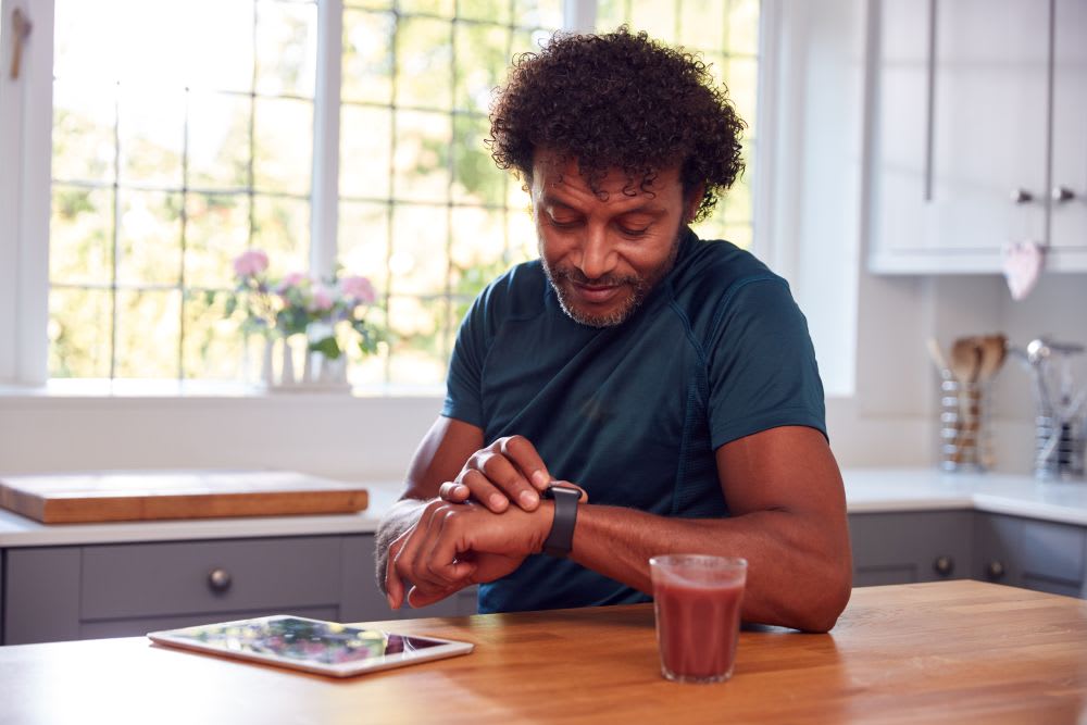 man looking at his watch