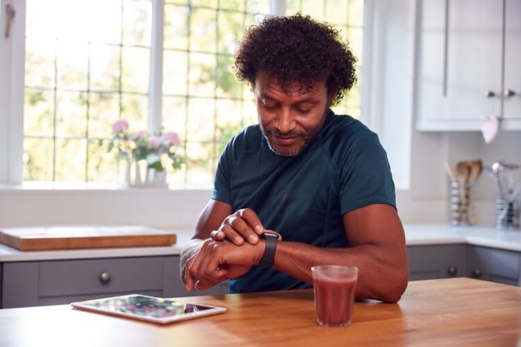 man looking at his watch