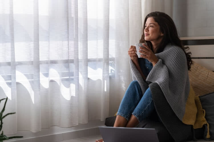 a woman drinking tea