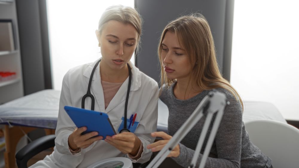 a doctor talking to a patient
