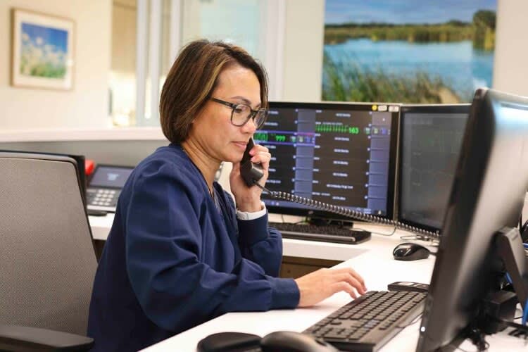 nurse answering a phone call