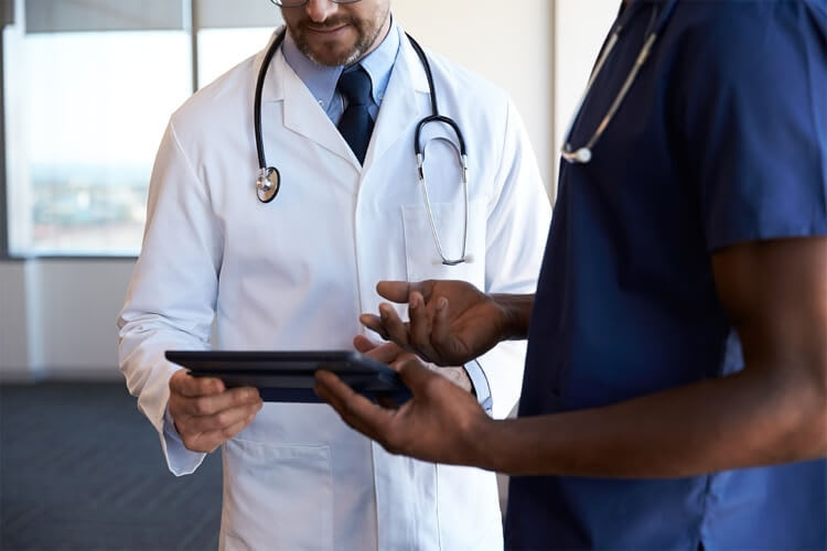 doctor and nurse talking