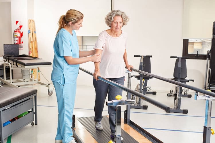 nurse assisting a patient