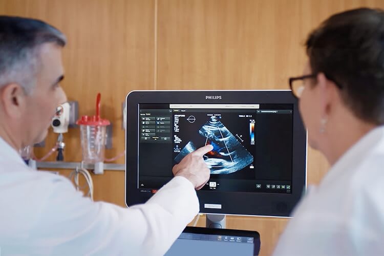 two doctors reviewing a scan