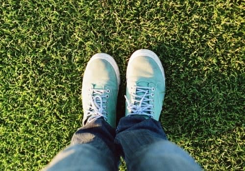 a person standing on grass