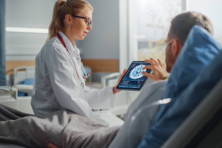 Doctor and patient reviewing xray