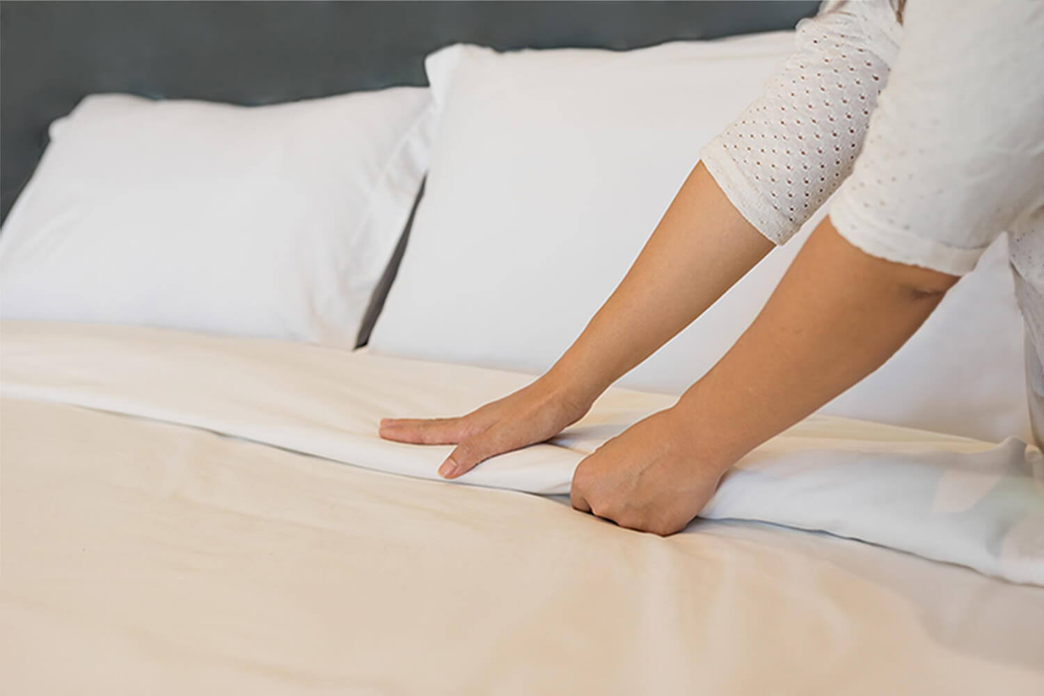 Nurse making bed