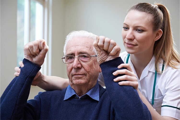 a nurse caring for an elderly patient