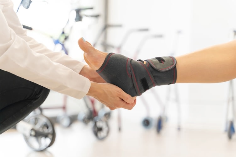 a patients foot getting examined