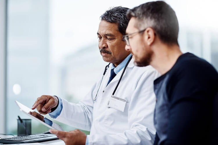 a doctor talking to a patient