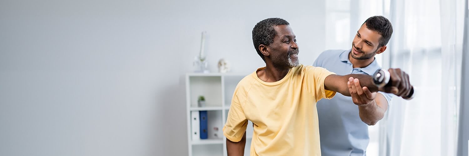 doctor helping a patient