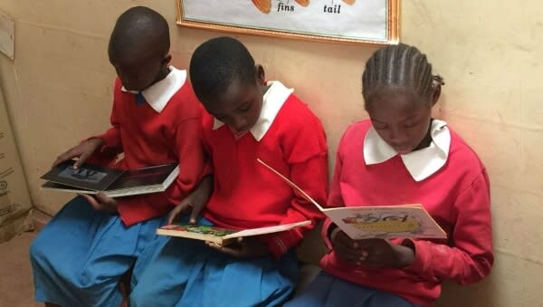 students reading books