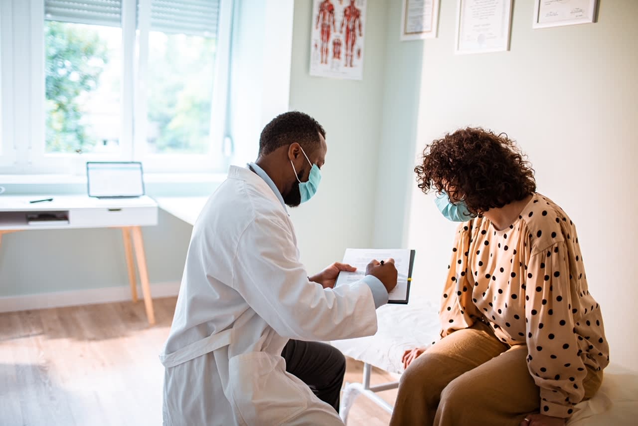 woman with doctor