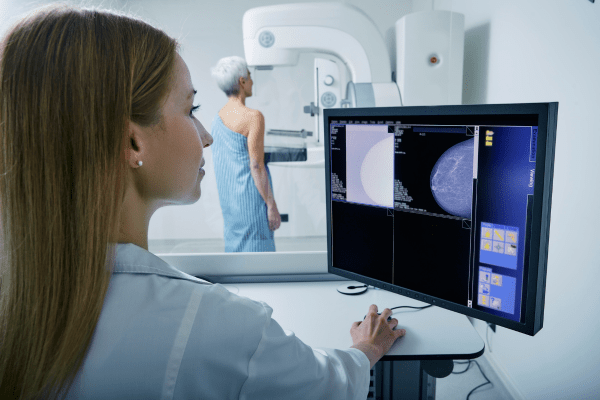 Woman getting mammogram