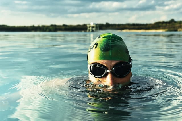 Man swimming in lake