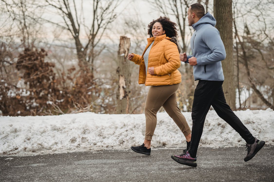 couple walking in the snow